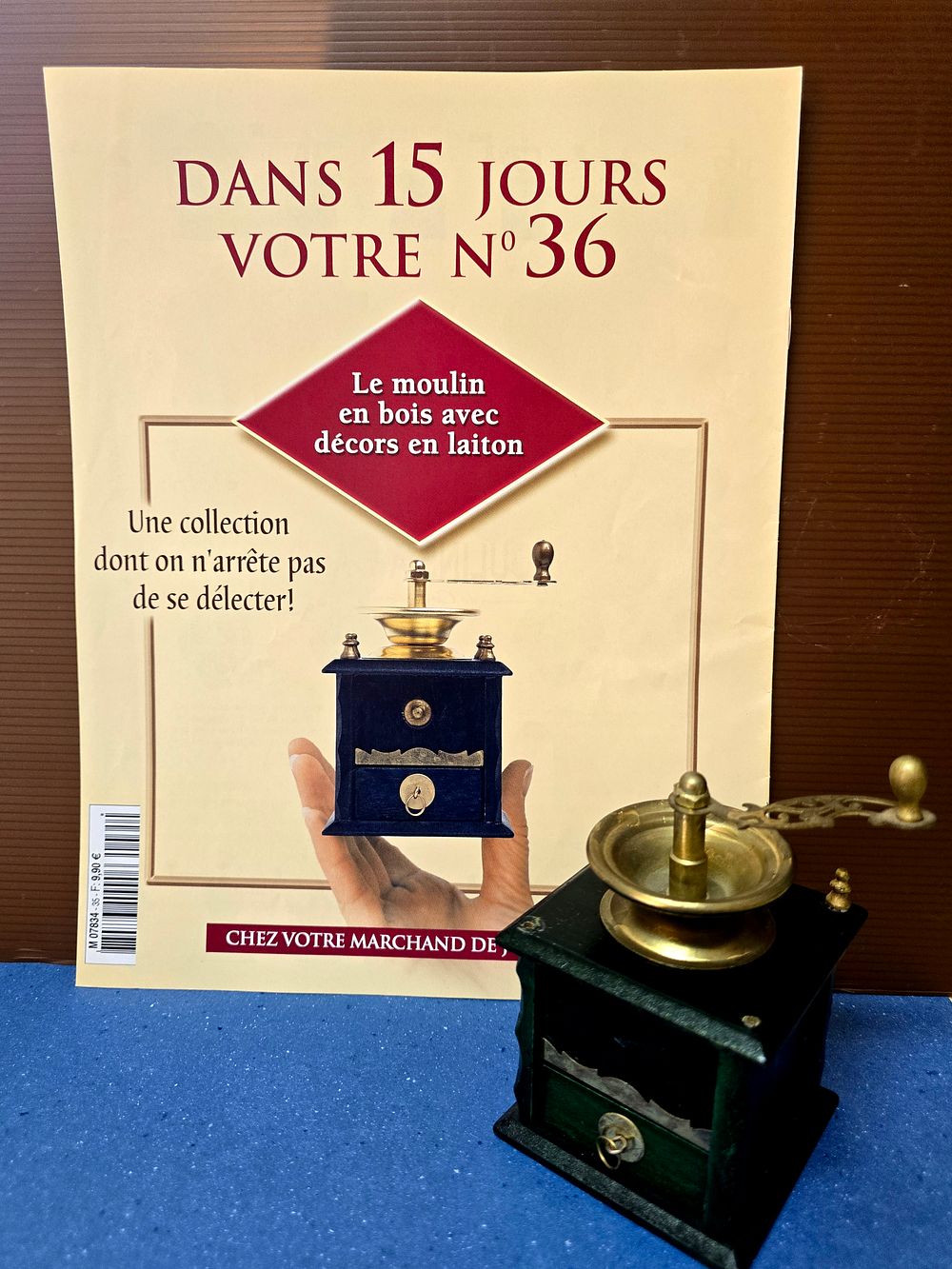 Miniature coffee grinder - perfect reproduction. A replica of an antique coffee grinder includes 