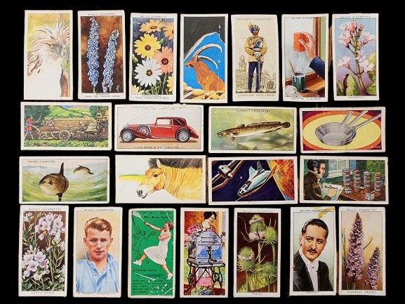 A collection of cards/tickets that were distributed with cigarette packs between the years 1926-1945