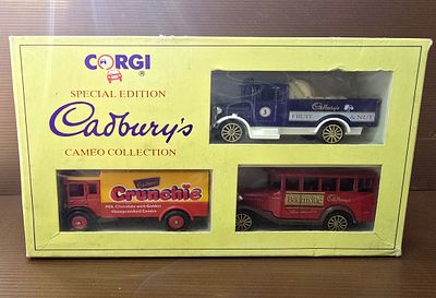 A box containing 3 Corgi mechanical models, rare metal models made in England. In the original 