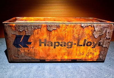 Miniature metal shipping container - German shipping company Hapag-Lloyd. The container opens 