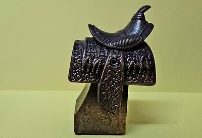 Vintage bronze-tone cast metal pencil sharpener - Western saddle. Made in Hong Kong. A 