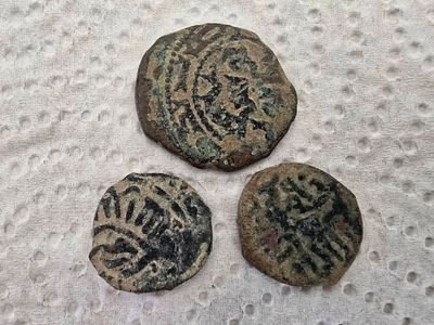 Coins. Unknown authenticity - sold as a replica. 
Items from the group of pottery jars, oil 