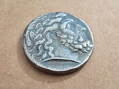 Roman/Greek coin, high quality replica. Diameter 23 mm. 
Unknown authenticity - sold as a 