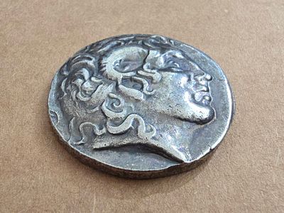 Roman/Greek coin, high quality replica. Diameter 30 mm. 
Unknown authenticity - sold as a 