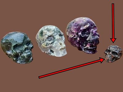 A skull figurine carved from a stone called Yooperlite. The item in this sale is marked with a 