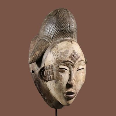 African female mask from the Punu, Gabon. This is a variant of the White Masks of Ogowe and is 