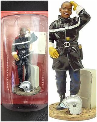 The rare series - a metal figurine of a firefighter from Ivory Coast in 1999, signed, made by 