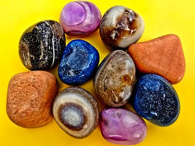 A collection of gemstones (tumblr stones) of various types, agate, jasper, amethyst and more. Th 