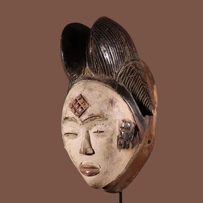 African mask from the Punu, Gabon Africa. Finely crafted african female mask from the Punu 