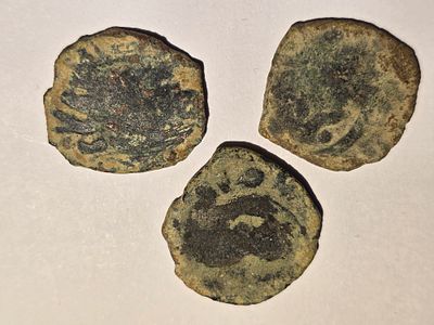 Coins. Unknown authenticity - sold as a replica. 
Items from the group of pottery jars, oil 