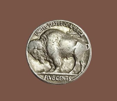 A 1936 Buffalo Nickel, an American collectible coin that was used between 1913 and 1938.