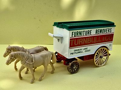 A collectible model of a furniture transport cart from the company "Turnbull & Co" manufactured 