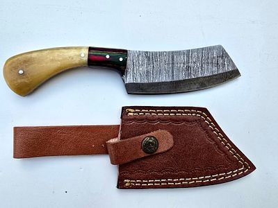 A handmade hunting knife made of Damascus steel, including a special deer bone handle. Includes 