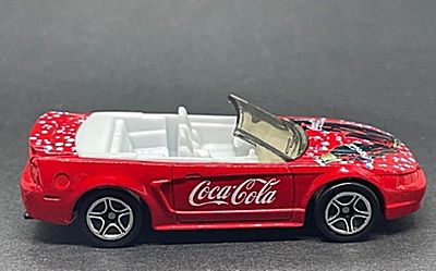 A collectible metal model of a 1999 Ford Mustang from Matchbox, as part of a collaboration 