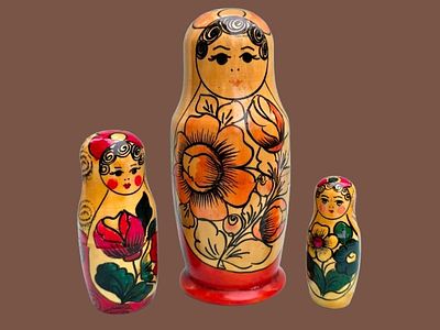 Three wooden matryoshka dolls (Russian nesting dolls), . In excellent condition.
