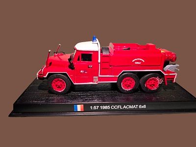A collectible metal model of a 1985 CCFL ACMAT 6x6 French fire truck, produced in 1:72 scale. A 