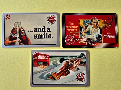 Rare and sought-after vintage Coca-Cola brand calling cards. The cards feature classic 