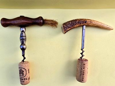 Pair of antique corkscrews. Wooden handles, deer bone and horse hair.
