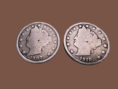 Two original "Liberty Head Nickel" coins from the United States. The coins feature a portrait of 