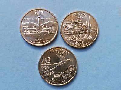 US Quarter Dollar Coins from the "50 States" Series of the United States. In new condition! 
We 