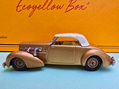 A rare collectible metal model of a 1937 Cord 812 Supercharged, a model of a classic car with 