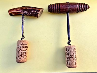 Pair of antique corkscrews. Wooden handles and deer bone.