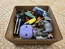 A diverse collection of plastic collectibles. Unsorted. Various situations.Image - 4