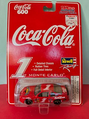 A 1:64 scale Coca-Cola branded collectible model made of metal (Diecast) and dated 1997. Chevrol 