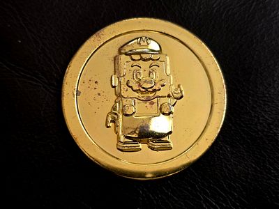 A golden LEGO Super Mario collectible coin, issued as a limited edition. Extremely rare!!!. The 