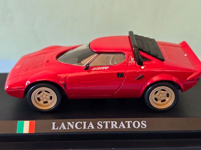 A collectible diecast model of a Lancia Stratos HF. The model is produced by Universal Hobbies 