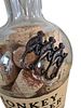 A whiskey bottle filled with corks from mainly Israeli wines. The height of the bottle is 27 cm.Image - 1