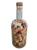 A whiskey bottle filled with corks from mainly Israeli wines. The height of the bottle is 27 cm.Image - 2