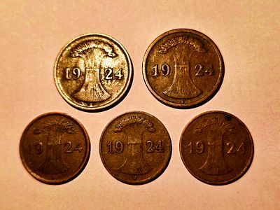 Reichspfennig coins from the Weimar Republic period in Germany. Items from the pottery, oil 