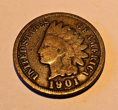 American "Indian Head Cent" coin from 1901. The coin depicts the image of "Liberty" wearing a 