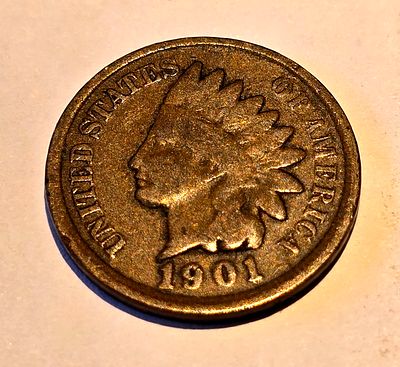 American "Indian Head Cent" coin from 1901. The coin depicts the image of "Liberty" wearing a 