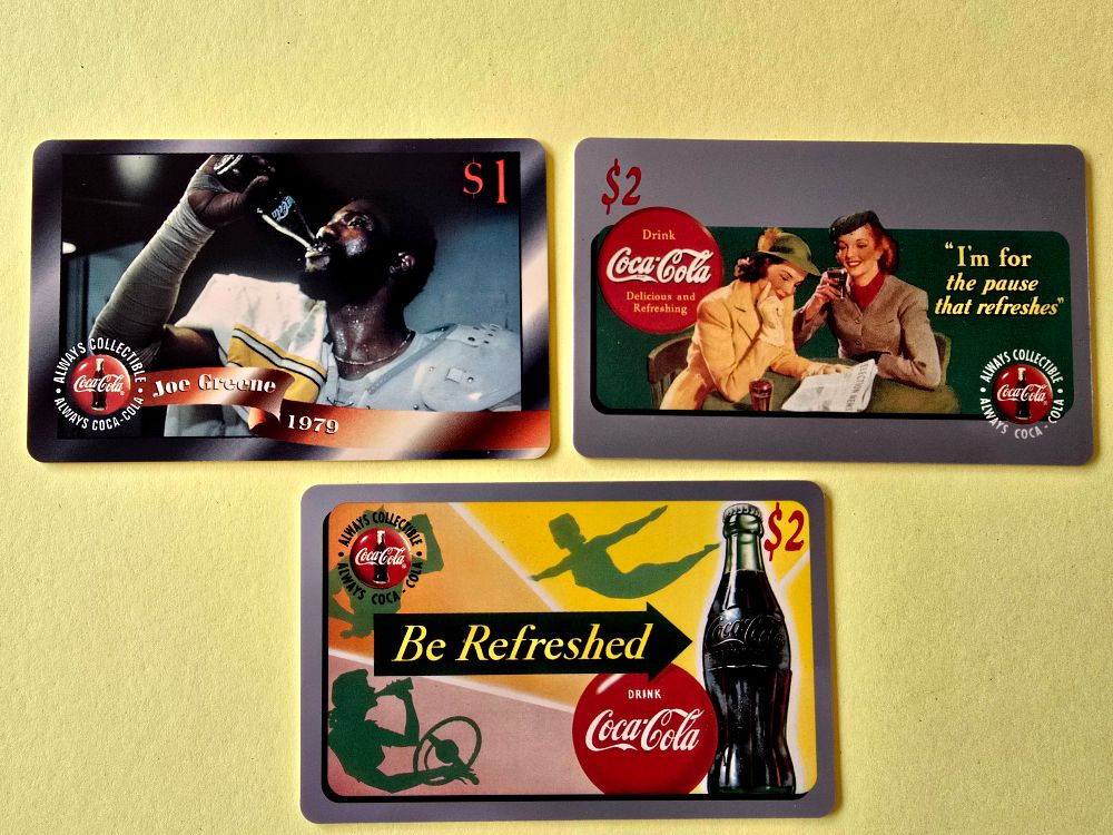 Rare and sought-after vintage Coca-Cola brand calling cards. Includes a calling card of football 