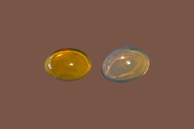 A pair of natural Ethiopian opals, known for their spectacular play of colors (fire opal). 