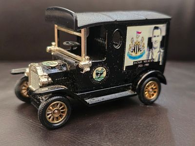 A collectible model of a black 1920 Ford Model T. Die-cast, featuring graphics of the Newcastle 