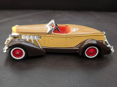 A 1935 Auburn 851 Matchbox Models of Yesteryear collectible metal car model. The model was 