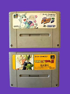 2 original game cartridges for the Japanese Super Famicom console. Top game: Super Bomberman 