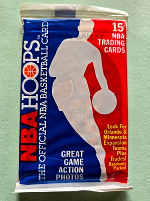 An unopened 1989-90 NBA Hoops basketball card pack, containing 15 trading cards. This is a "Wax 
