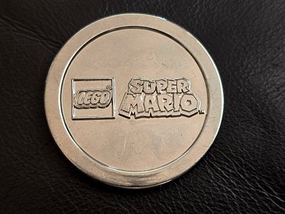 A Silvered LEGO Super Mario collectible coin, issued as a limited edition. Extremely rare!!!. The 