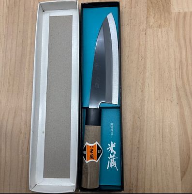 Vintage Japanese Santoku knife made by Yonezoh. The knife is unused in its original packaging. 