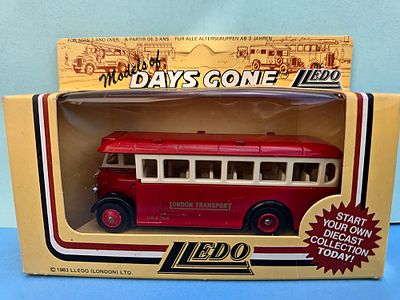 Collectible model of a "Redburns" motor service bus. Produced by Lledo as part of the "Days 