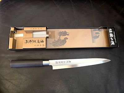 Professional Japanese Yanagiba knife for making sashimi and sushi, made by the "Masamune" brand 