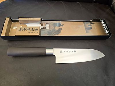 A Japanese Santoku knife, Noshu Masamune type, with a blade length of 170 mm. The knife is made 