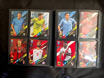 Mixed collectible card album. Including Pokemon, Yu-Gi-Oh, Football, NBA and Baseball. 
The 