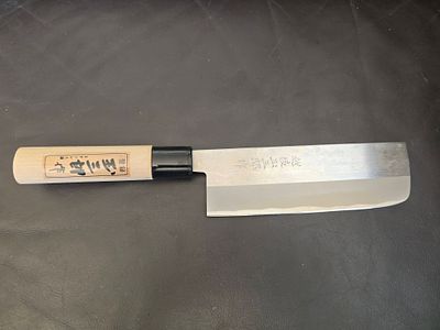 Traditional Japanese Nakiri knife - a professional chef's knife. The manufacturer (Hanko) 