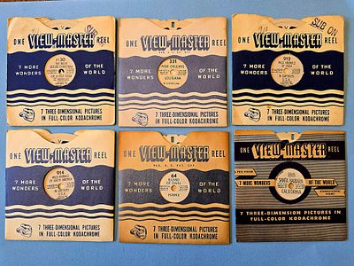 The image shows a collection of six original vintage View-Master Reels covers in a classic 
