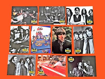 A collection of trading cards from The Beatles from The River Group series, published in 1993. T 